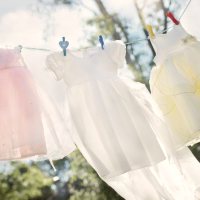 Nina enjoys the smell of fresh laundry