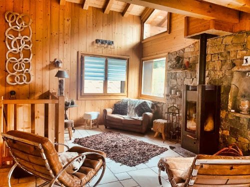 Catered Chalet Le Prele has a cosy loundge area with fire